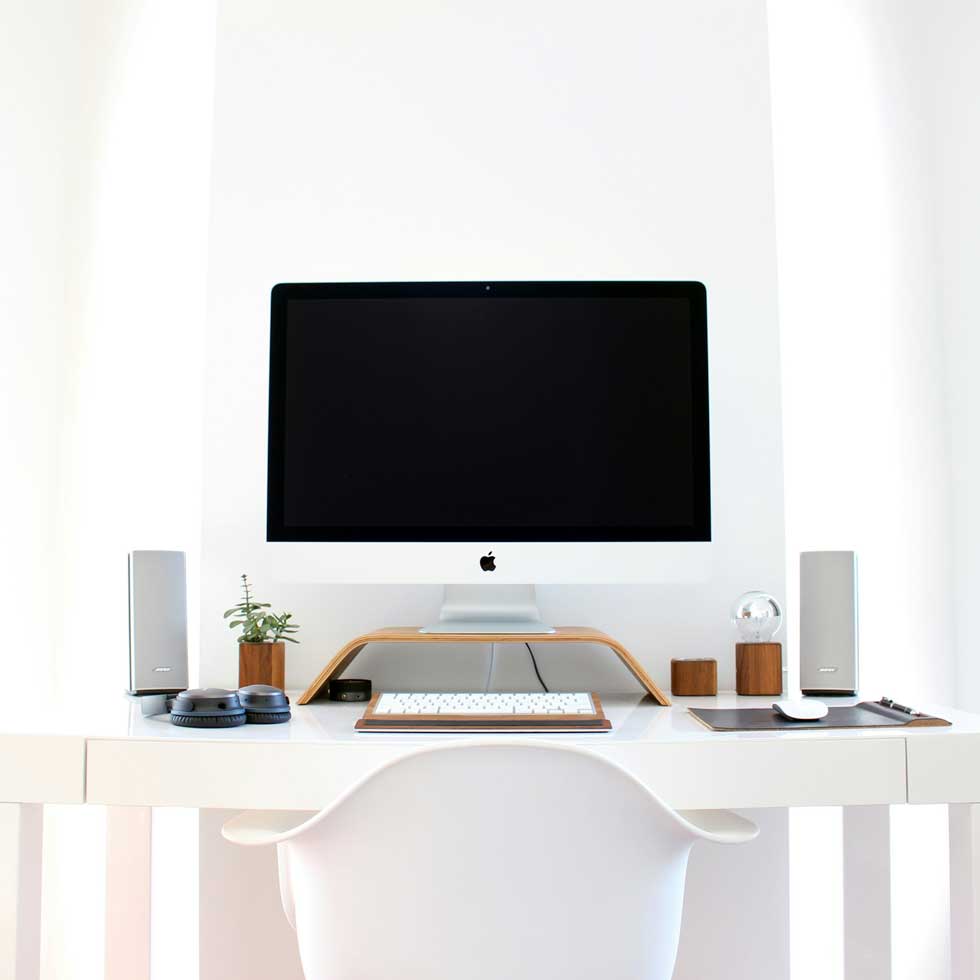 Apple Mac computer desk